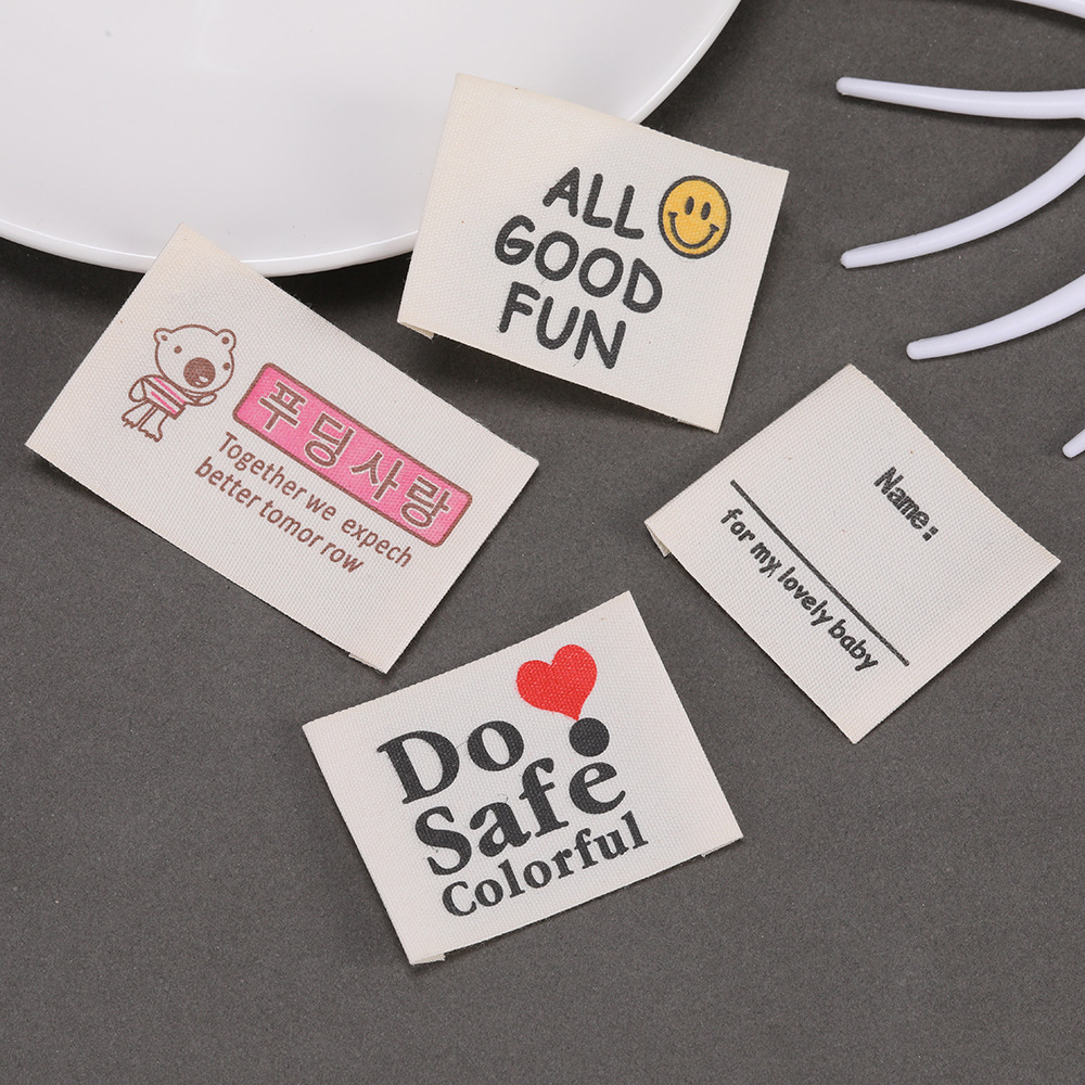 Baby Clothing Tags - ملصقات قطنية مخصصة مطبوعة بشعار خاص،